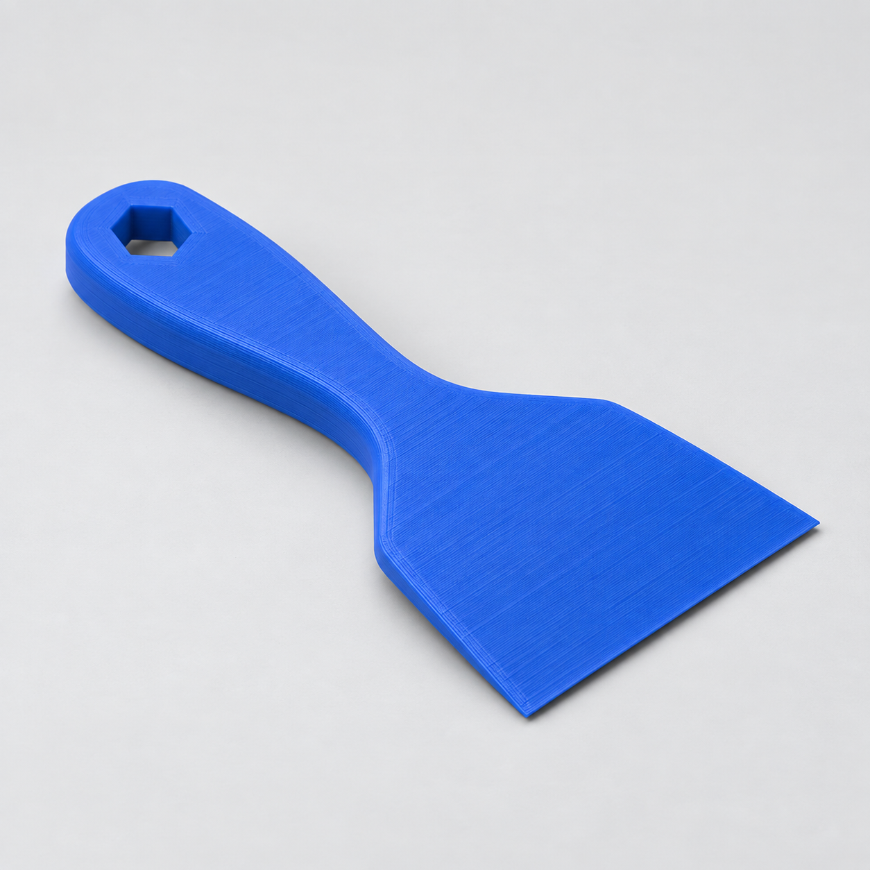 Illustrative concept for plastic bed scraper