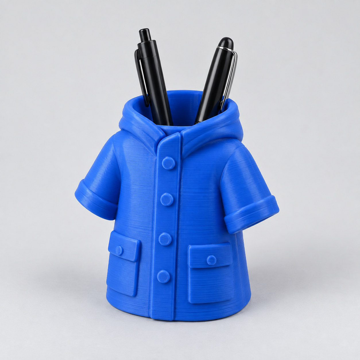 Illustrative concept for raincoat pencil holder